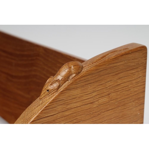 338 - A ROBERT THOMPSON ADZED OAK BOOK TROUGH, the quadrant ends carved with mouse trademark in high relie... 