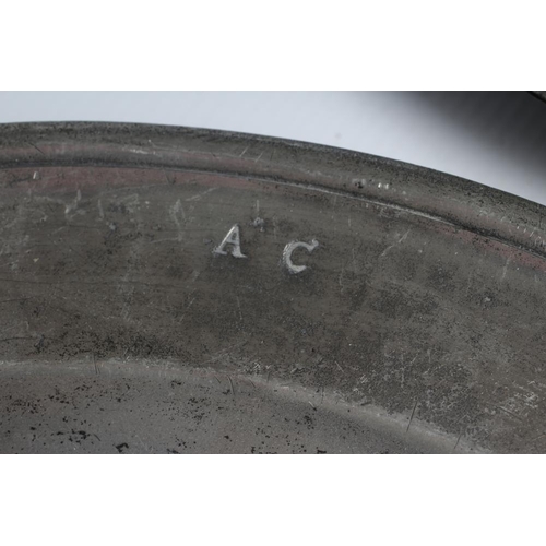 341 - A GEORGIAN PEWTER DISH, 18th century, with single rim and ownership initials 13 1/2