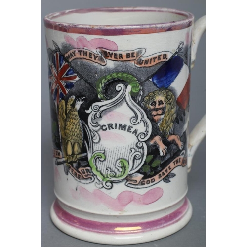 40 - A SUNDERLAND PINK LUSTRE PEARLWARE FROG MUG, c.1865, of plain cylindrical form printed in black to c... 