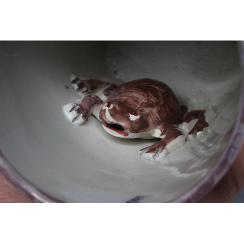 40 - A SUNDERLAND PINK LUSTRE PEARLWARE FROG MUG, c.1865, of plain cylindrical form printed in black to c... 