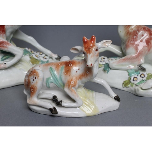 49 - A DERBY PORCELAIN STAG AND HIND, c.1760, each modelled recumbent on a flower encrusted shaped base, ... 