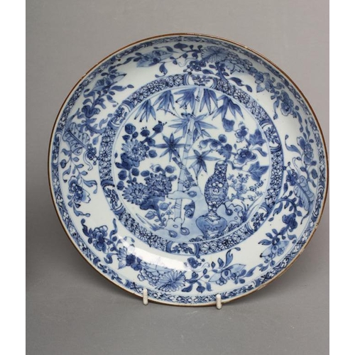 5 - TWO CHINESE PORCELAIN SAUCER DISHES of plain circular form, both painted in underglaze blue, one wit... 