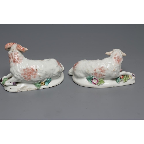 50 - A DERBY PORCELAIN RAM AND EWE, c.1760, each modelled recumbent on a flower encrusted shaped base, pa... 