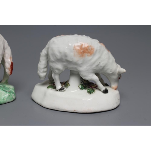 51 - A DERBY PORCELAIN GRAZING EWE, c.1760, standing on a flower enrusted shaped base, the fascia painted... 