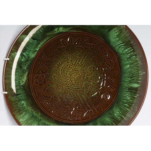 72 - A CHRISTOPHER DRESSER FOR AULT PLATTER, early 20th century, of plain circular form, the central roun... 