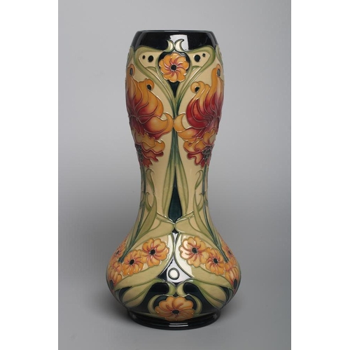 75 - A MOORCROFT POTTERY VASE, 2006, of tall baluster form with bulbous neck, tubelined and painted in sh... 