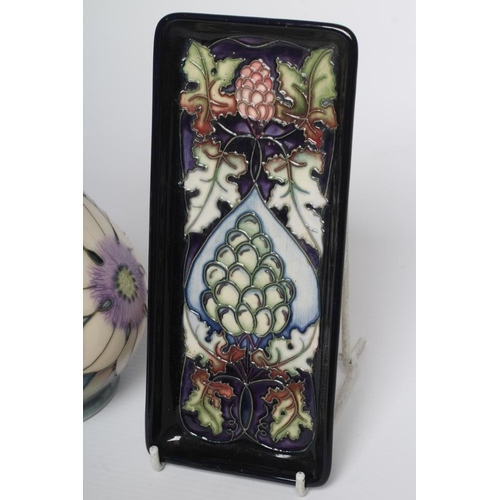 77 - A MOORCROFT POTTERY VASE, 2002, of baluster form, tubelined and painted in colours with the Clematis... 