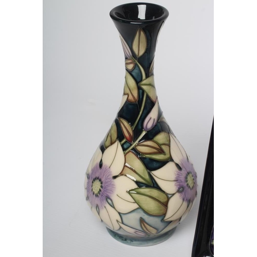 77 - A MOORCROFT POTTERY VASE, 2002, of baluster form, tubelined and painted in colours with the Clematis... 