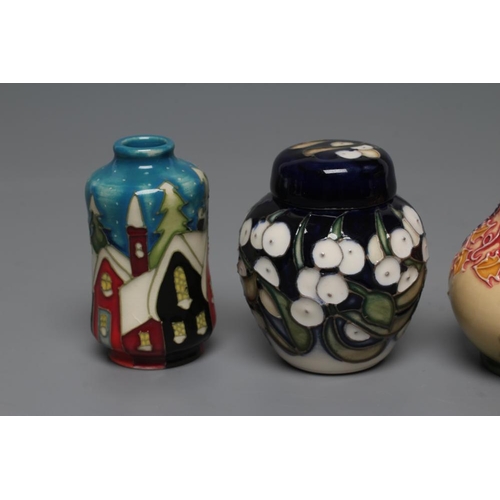 78 - A COLLECTION OF THREE MINIATURE MOORCROFT POTTERY VASES, modern, comprising Nordic Houses, Coral Hib... 