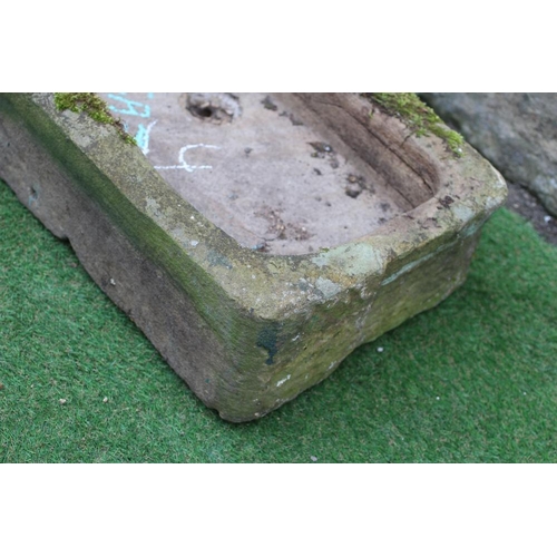 451 - A SANDSTONE TROUGH of well cut oblong form, 30