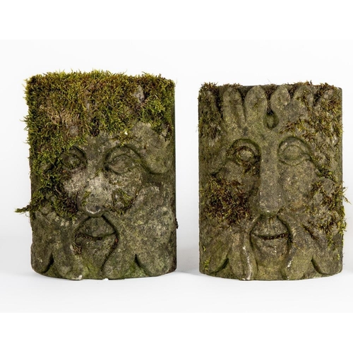 452 - A PAIR OF CARVED SANDSTONE GREEN MAN WALL MASKS, c.1900, of bowed oblong form, realistically modelle... 