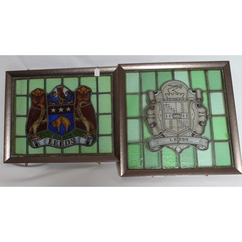 455 - A STAINED GLASS PANEL DEPICTING THE ARMS OF THE CITY OF LEEDS, 20th century, within a plain green gl... 