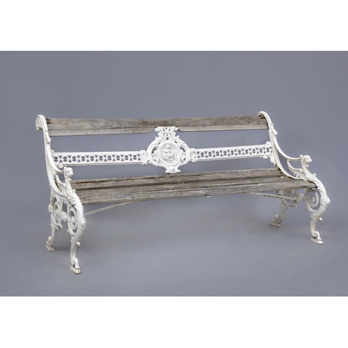 460 - A CAST IRON GARDEN BENCH, c.1900, with wooden slatted seat and top rail, the horizontal splat pierce... 