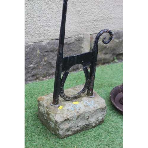 464 - A CAST IRON BOOT SCRAPER, c. 1900, on horse shoe support, the wrythen turned square hand rest with p... 