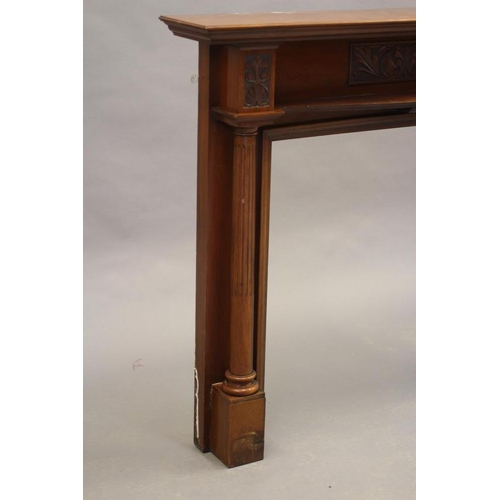 485 - A MAHOGANY FIRE SURROUND, early 20th century, the moulded shelf raised on turned fluted columns head... 