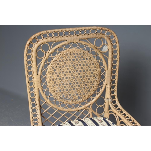 486 - A HEYWOOD & WAKEFIELD STYLE GARDEN ROOM PLATFORM ROCKER, the mildly arched wicker back woven with a ... 