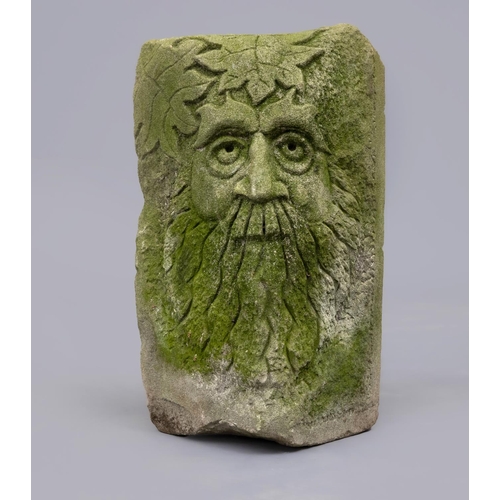 487 - A CARVED SANDSTONE GREEN MAN MASK CORNER STONE, 10 1/4