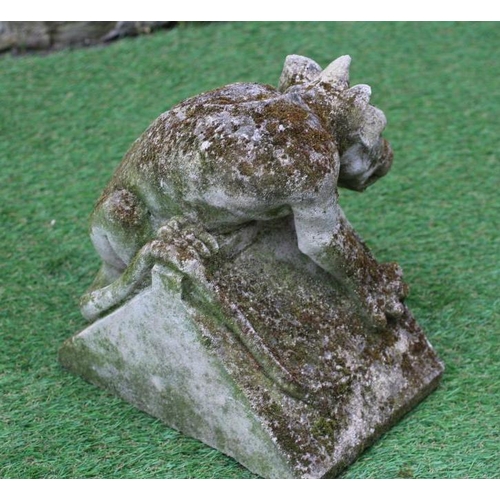 493 - A PAIR OF CAST STONE DRAGON GARGOYLES realistically modelled on a triangular base, 11