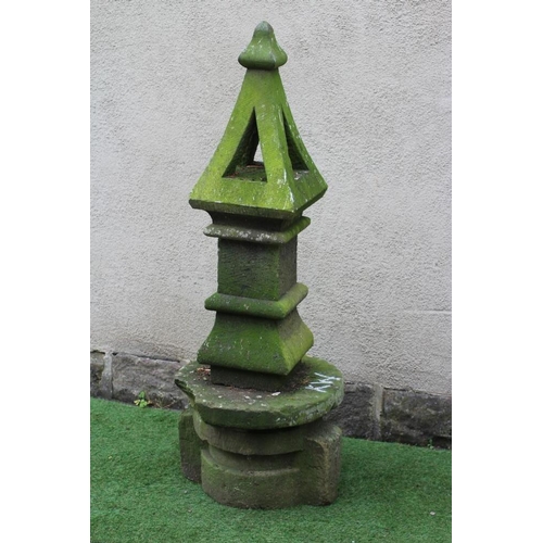 496 - A SANDSTONE FINIAL of square form, the pierced tapering surmount with ogee finial, on ogee moulded b... 