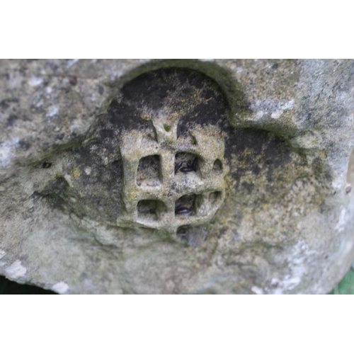 500 - A SUBSTANTIAL SANDSTONE PLANTER, 19th century, of deep circular form carved with a band of flowerhea... 