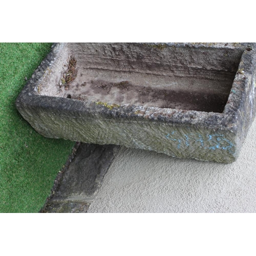 501 - A SANDSTONE TROUGH of well cut oblong form with tapering sides, 33