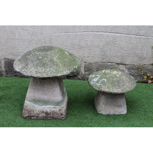 517 - A CAST STONE MUSHROOM on square tapering base, 21 1/2