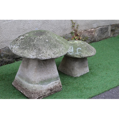 517 - A CAST STONE MUSHROOM on square tapering base, 21 1/2