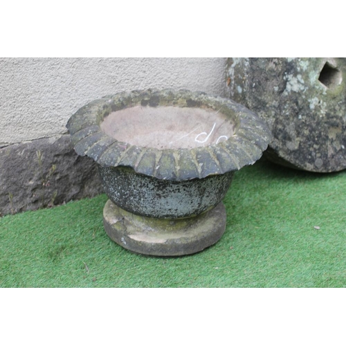 519 - A SMALL SANDSTONE FOUNTAIN, the bowl with everted ovolu moulded rim, on moulded circular base, 21