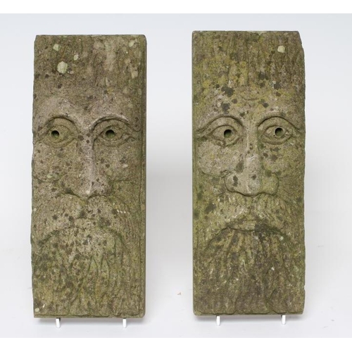 523 - A PAIR OF SANDSTONE BEARDED MAN WALL MASKS of shallow oblong form, 5