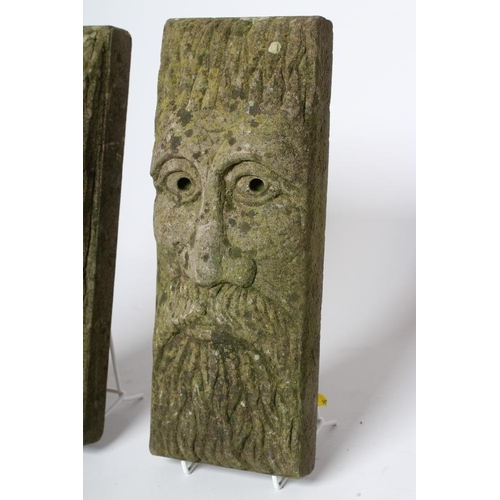 523 - A PAIR OF SANDSTONE BEARDED MAN WALL MASKS of shallow oblong form, 5