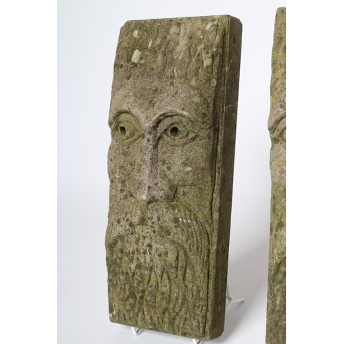 523 - A PAIR OF SANDSTONE BEARDED MAN WALL MASKS of shallow oblong form, 5