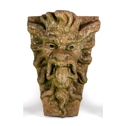 524 - A TERRACOTTA GARGOYLE KEY STONE, by Alan Frost, boldly modelled in high relief, signed and dated 201... 