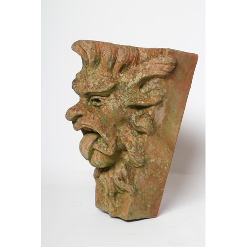 524 - A TERRACOTTA GARGOYLE KEY STONE, by Alan Frost, boldly modelled in high relief, signed and dated 201... 