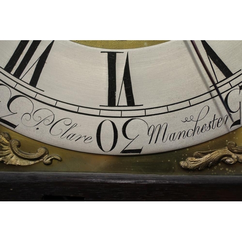 561 - AN OAK LONGCASE CLOCK by P Clare, Manchester, the eight day movement with anchor escapement striking... 