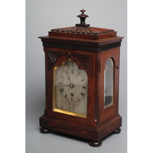 570 - A GEORGE IV ROSEWOOD BRACKET CLOCK by Purvis, North Audley Street, London, the single fusee movement... 