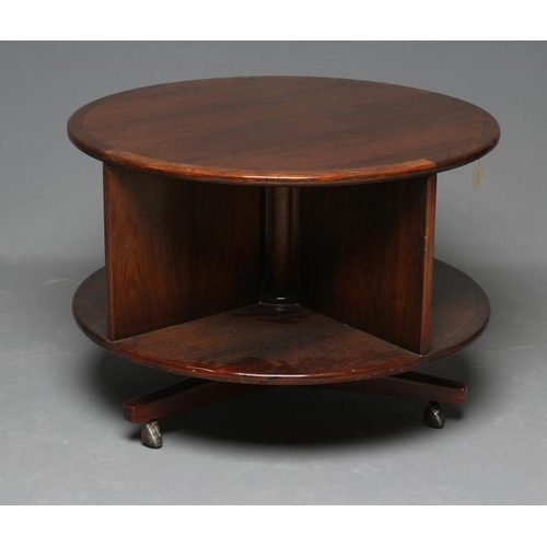 583 - A ROSEWOOD REVOLVING BOOKCASE, mid 20th century, of two tier circular form with turned central suppo... 