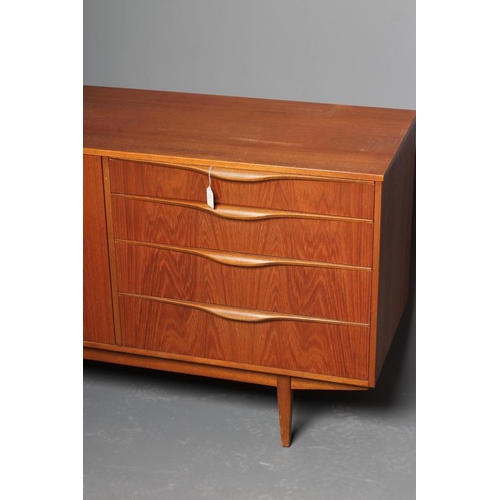 588 - A TEAK LONG SIDEBOARD BY SUTCLIFFE OF TODMORDEN, mid 20th century, comprising four drawers including... 