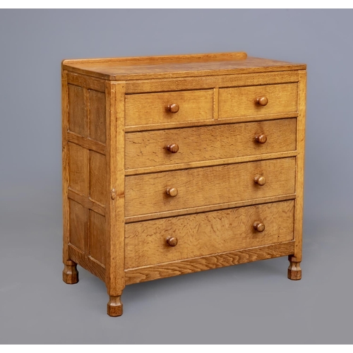 597 - A ROBERT THOMPSON ADZED OAK CHEST, the moulded edged canted oblong top with ledge back, two short ov... 