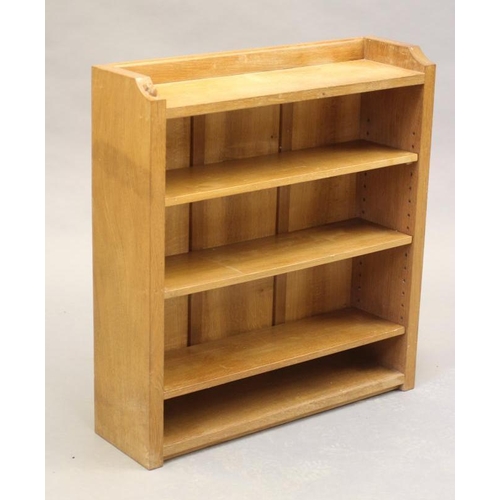 598 - A ROBERT THOMPSON ADZED OAK OPEN BOOKCASE of oblong form with three quarter galleried top, three adj... 