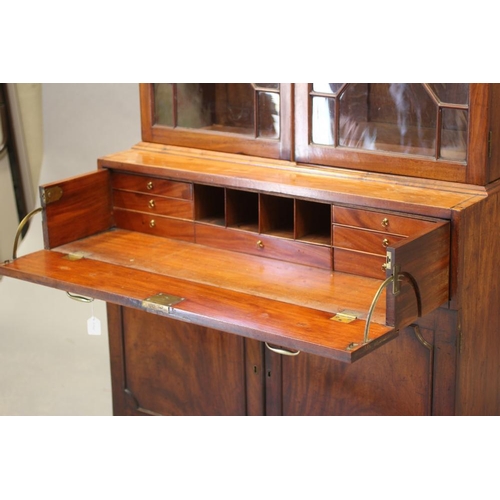 608 - A GEORGIAN MAHOGANY SECRETAIRE BOOKCASE, late 18th century, the moulded cornice over two astragal gl... 