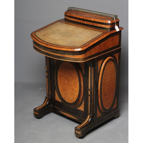 609 - A VICTORIAN YEW AND EBONISED DAVENPORT, the raised stationery compartment with brass gallery on hing... 