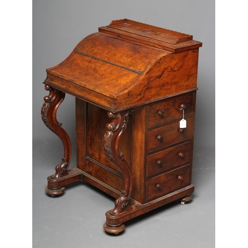 613 - A VICTORIAN BURR WALNUT DAVENPORT, the rise and fall stationery compartment with drawers and pigeon ... 