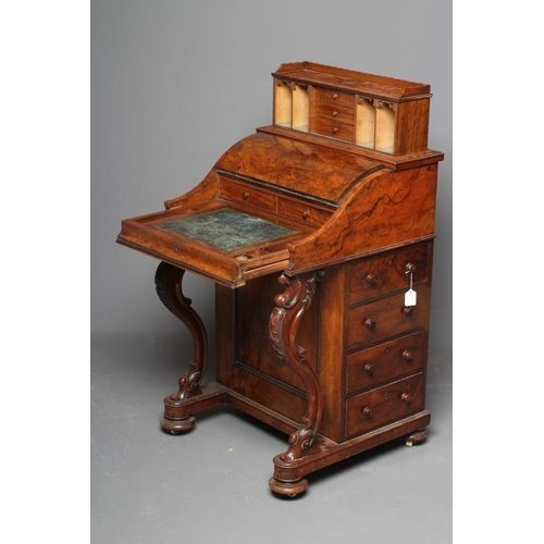 613 - A VICTORIAN BURR WALNUT DAVENPORT, the rise and fall stationery compartment with drawers and pigeon ... 