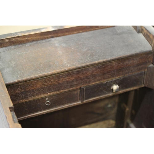 616 - A GEORGIAN OAK PANELLED CHEST, third quarter 18th century, the moulded edged split hinged lid openin... 