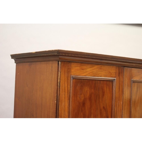 622 - A GEORGIAN MAHOGANY LINEN PRESS, third quarter 18th century, the dentil moulded cornice over two pan... 