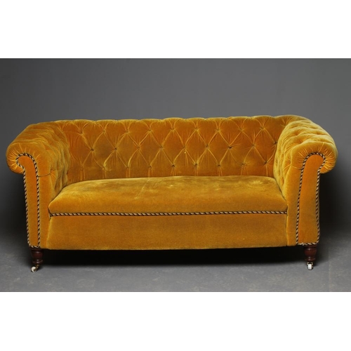 624 - A VICTORIAN WALNUT FRAMED CHESTERFIELD DROP END SETTEE button upholstered in mustard yellow velvet, ... 