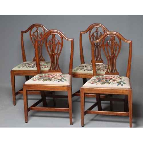 631 - A SET OF FOUR GEORGIAN MAHOGANY DINING CHAIRS, late 18th century, the arched top rail over pierced l... 