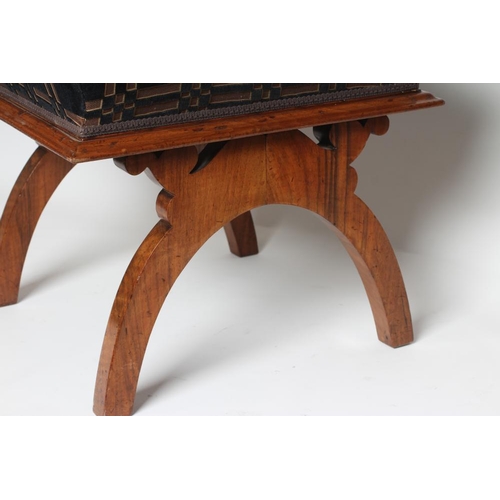 637 - A VICTORIAN WALNUT DRESSING STOOL of square form, the raised upholstered seat in black and gold cut ... 