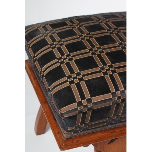 637 - A VICTORIAN WALNUT DRESSING STOOL of square form, the raised upholstered seat in black and gold cut ... 