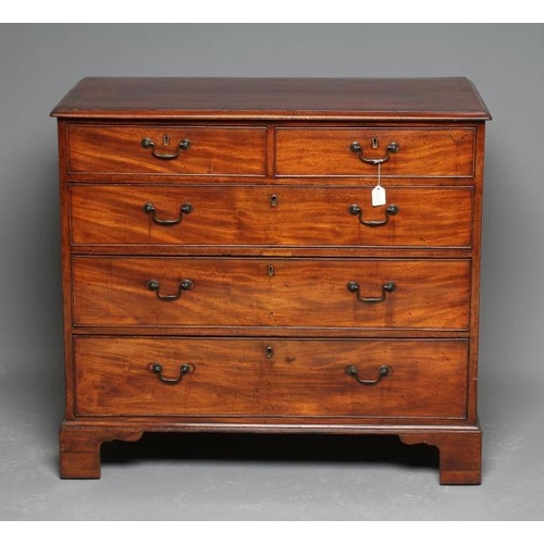 638 - A GEORGIAN MAHOGANY CHEST, late 18th century, the moulded edge and banded top with stringing, two sh... 